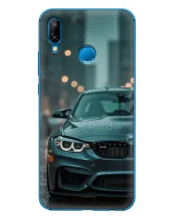 Чехол для Huawei P20 Lite (2019) с картинкой «BMW в огнях города»
