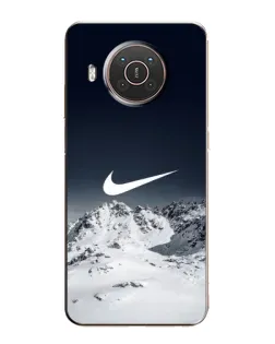 Чехол для Nokia X20 с картинкой «Nike — зимние горы»