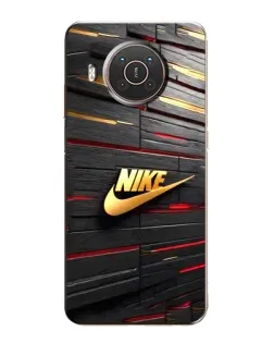 Чехол для Nokia X20 с картинкой «Золотой Nike на металле»
