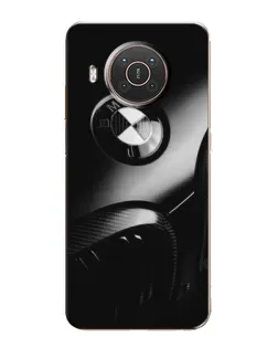 Чехол для Nokia X20 с картинкой «Эмблема BMW — макро»