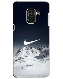 Чехол для Samsung Galaxy A8 Plus 2018 (A730F) с картинкой «Nike — зимние горы»