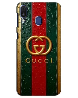 Чохол для Samsung Galaxy M20 (M205) з картинкою «Gucci — фірмова смуга та золото» Чохол для Samsung Galaxy M20 (M205) з картинкою «Gucci — фірмова смуга та золото»