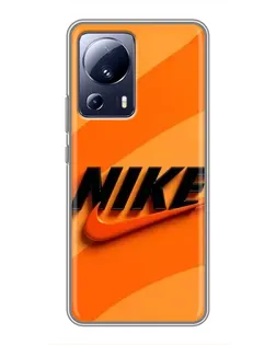 Чехол для Xiaomi 13 Lite с картинкой «Оранжевый драйв Nike»