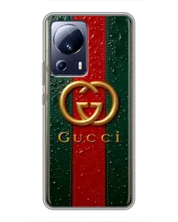 Чехол для Xiaomi 13 Lite с картинкой «Gucci — фирменная полоса и золото» Чехол для Xiaomi 13 Lite с картинкой «Gucci — фирменная полоса и золото»